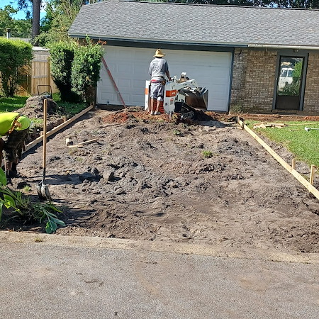 French drains gutters and driveways fixing washouts before you repour